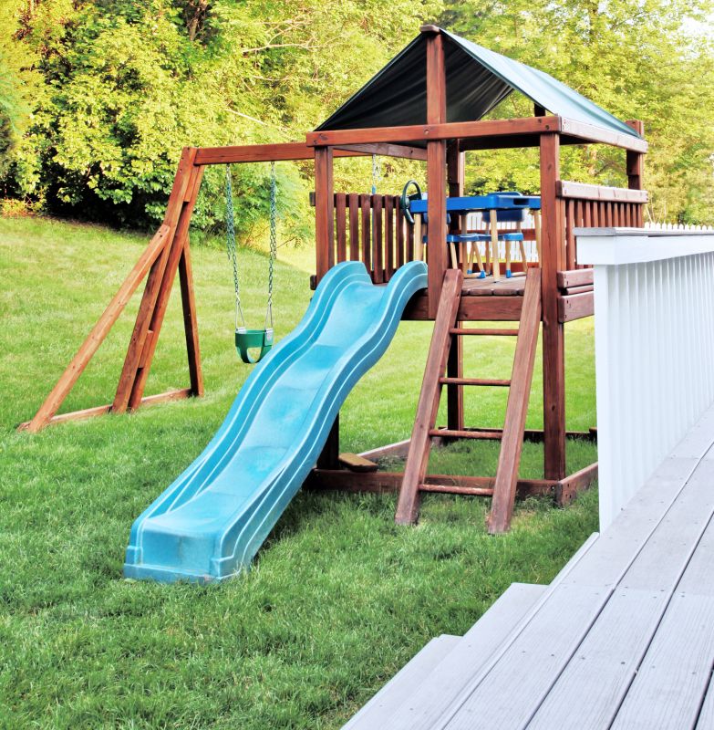 Wooden Swing Set Installation in Kansas City, KS